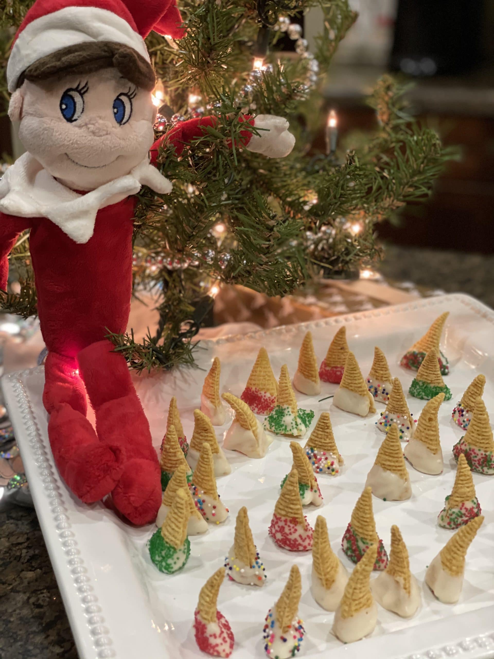 plush elf with edible elf hat treats