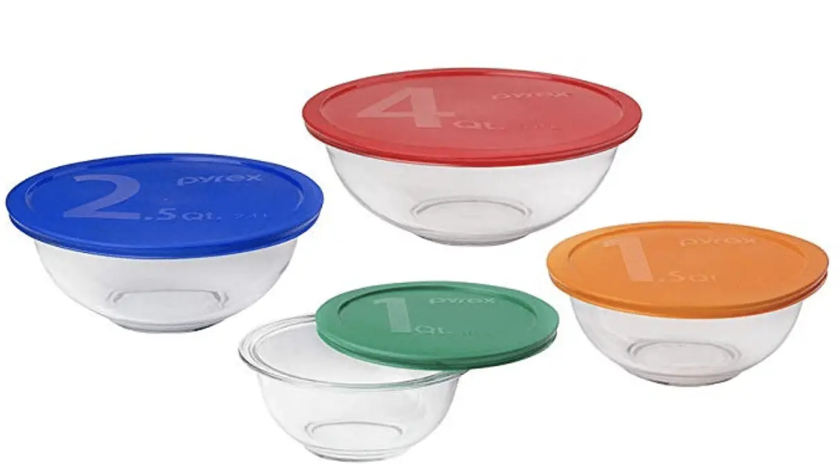 4 pyrex glass bowls with colorful lids