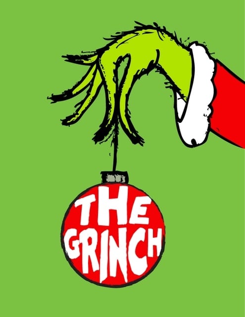 The Grinch Who Stole Christmas hand holding an ornament