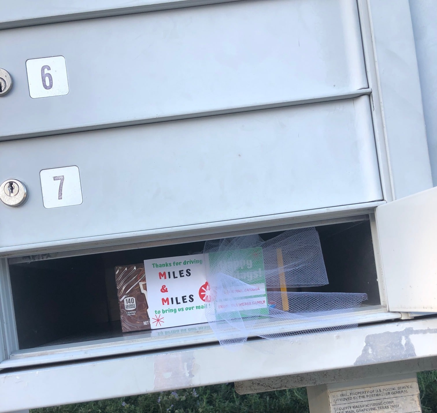 Candy treat and card for a mailman in a mailbox