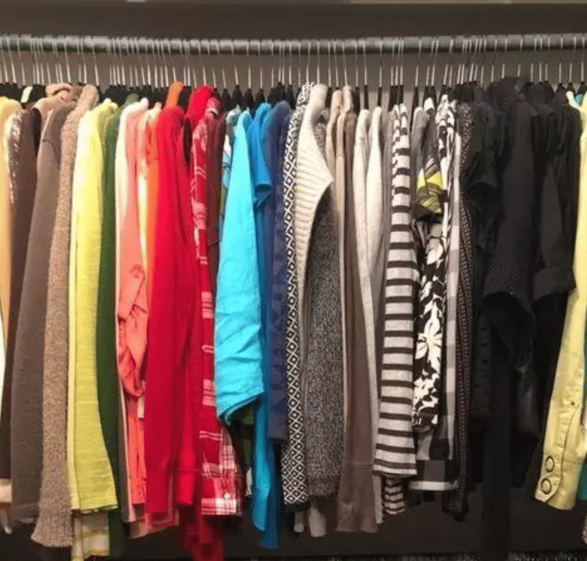 organized closet with hanging clothes