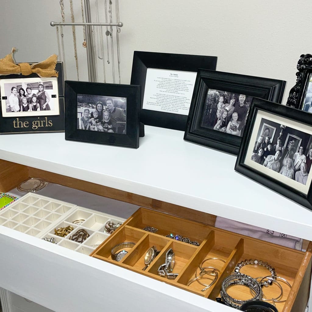 Open drawer of organized jewelry