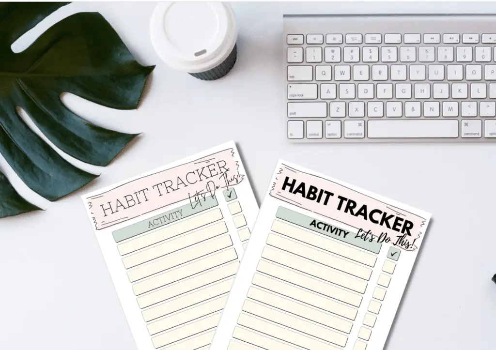 Printable Habit trackers on a desk