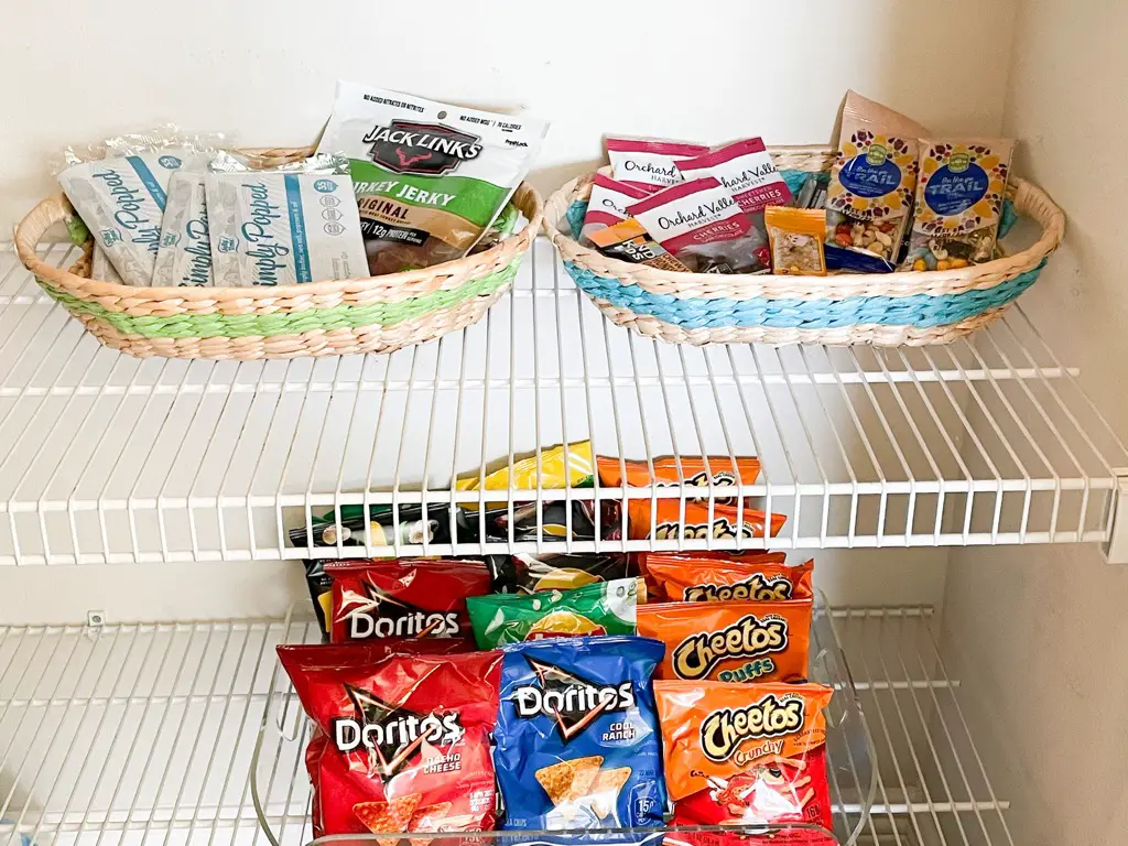 Pantry snacks organized in baskets